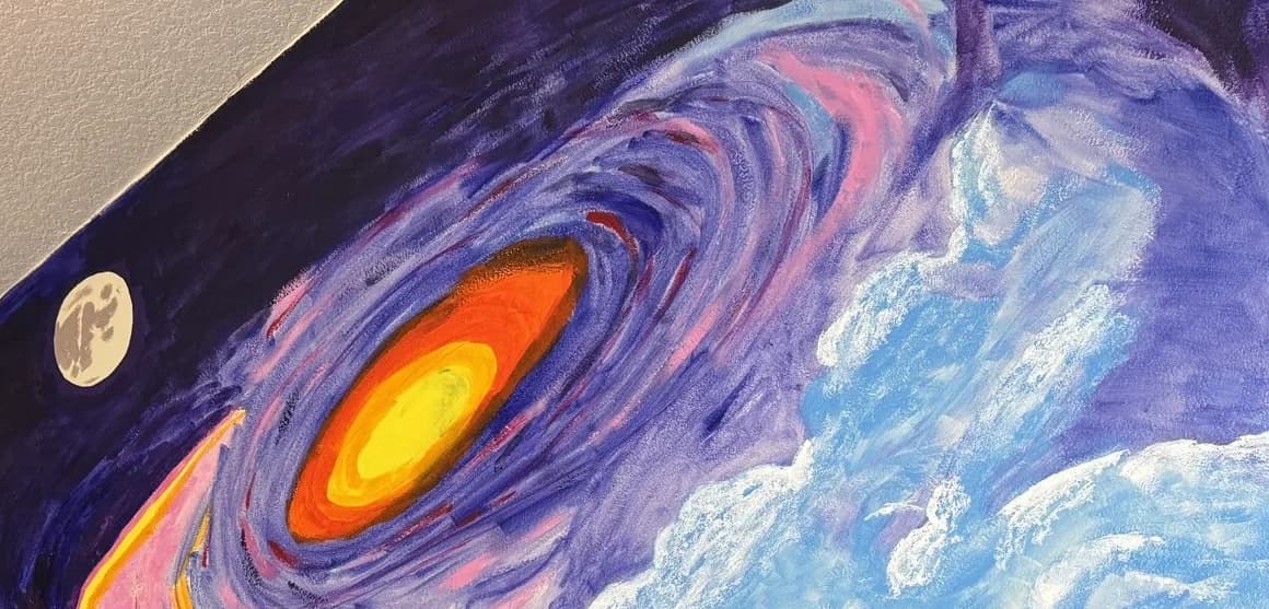 Close-up of a mural Stefan painted: a swirling purple galaxy with a bright orange center, a full moon, and white clouds